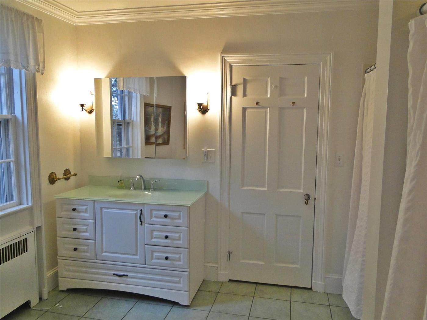 Newly refinished Master bath with two showers, tub, new vanity